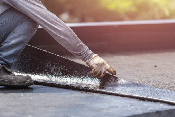 Professional Waterproofing technician working in Carteret, NJ